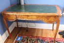 Art Nouveau Burl Wood Desk With Swag Design And Green Leather  Top.
