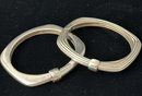 Pair Of Slane & Slane Hinged Sterling Silver Bracelets