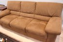 Contemporary 3 Seat Sofa In Medium Beige Tone With Soft Fabric Finish In Very Good Condition.