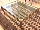 Elegant Neoclassic Style Gilt Metal Coffee Table With Glass Top & Knotted Metal Stretcher