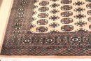 Bukhara Style Handmade Wool Area Rug With Beige Background & Soft Neutral Shade