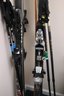 Two Pairs Of Pre-owned Skis, Featuring Atomic 164, CM, And K2 153 Cm With Bindings & Ski Poles