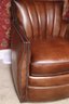 Hooker Fine Quality Cozy Little Leather Swivel Armchair-Tufted Clamshell Style Backrest And Nail Head Trim