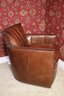 Hooker Fine Quality Cozy Little Leather Swivel Armchair-Tufted Clamshell Style Backrest And Nail Head Trim