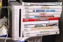 Nintendo Wii Includes Remotes, Microphone, Super Mario Bros, Super Paper Mario, Wii Play, Super Monkey Ball