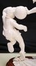 Stunning Carved Bone Statue Of Boys Playing With Ball In Midair On Wood Base With Lucite Base & Cover.