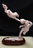 Stunning Carved Bone Statue Of Boys Playing With Ball In Midair On Wood Base With Lucite Base & Cover.