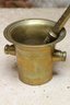 An Antique Brass Mortar And Pestle