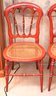Pair Of Vintage Cinnabar Colored Chairs With Cane Seats