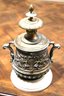 Antique Decorative Brass Or Bronze Covered Urn With Renaissance Motif On Marble Base