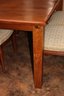 Vintage Custom Teak Cozy Wood Dining Table Made In Bali With 4 Chairs That Have A Caned Backrest, Extra Leaf