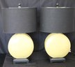 Pair Of Stylish Contemporary Lamps With Sleek Black Shades In A Light Olive Tone