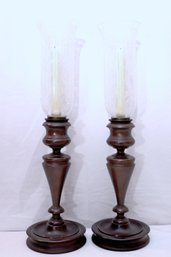 Pair Of Wood Candlesticks With Tall Etched Glass Hurricane Shades.