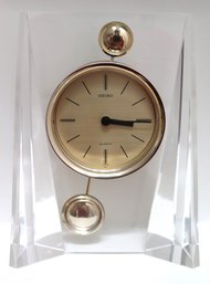 Vintage Seiko Modern Lucite Clock With Quartz Movement And Pendulum.