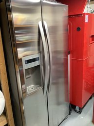 An LG SS Side By Side Refrigerator With Automatic Ice Maker And Ice/water Dispenser.