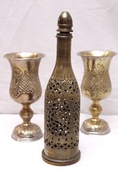 Three Brass Items With Decorative Perforated Bottle Cover And 2 Inches Tall Cups.