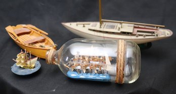 Vintage Handcrafted Nautical Decor Includes Rowboat, Sail Ship And Miniature Ship In Glass Bottle