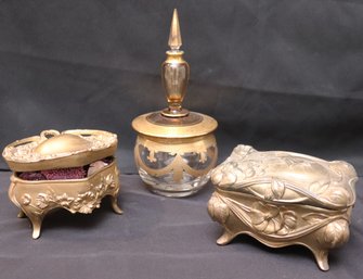 Two Art Nouveau Metal Jewelry Caskets And Italian Gilded Glass Vanity Bowl With Perfume Bottle Lid.