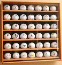 42 Framed Golf Balls With School And Resort Emblems.