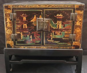 Antique Black Lacquered Chinese Chest On Stand With Gold Painted Pagodas.