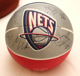 A Collectable, Autographed Nets Mini Basketball By Baden SB3R-326.