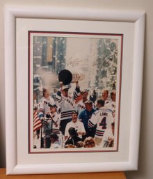 A Framed And Autographed NY Rangers Stanley Cup Winners Photo.