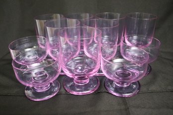 Set Of Fine Light Purple Glassware With 7 Tall And 4 Coupe.