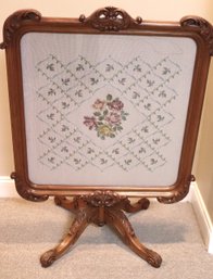 Chippendale Style Drop Front Wooden Table With Needlepoint Top.