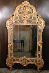 Vintage Don Ruseau Inc NY City French Louis XV Carved Giltwood Mirror With Floral Basket Crest