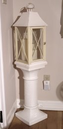 Ceramic Pedestal With A Decorative Lantern