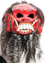 Traditional Hand Painted Mask From Indonesia Made From Papier Mache In A Fiery Red Tone
