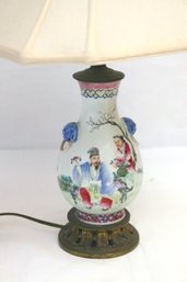 Vintage Chinese Hand Painted Lamp With Wise Man And Child And Blue Foo Dog Handles.