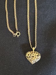 14K YG PRETTY OPEN HEART PENDANT ON A 16 INCH FINE LINK NECKLACE