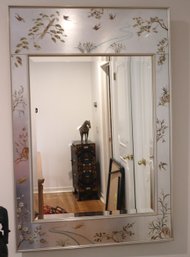 Beautiful Glass Wall Mirror With A Beveled Edge And Painted Highlights Along The Border