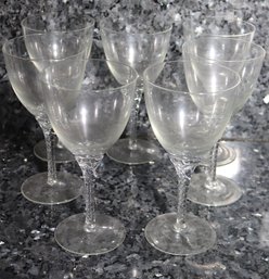Set Of 7 Elegant Wine Glasses With Twisted Stems 7 Inches Tall.