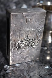 VINTAGE SILVER METAL CIGARETTE CASE WITH RAISED SCENE OF COURTYARD PARTY