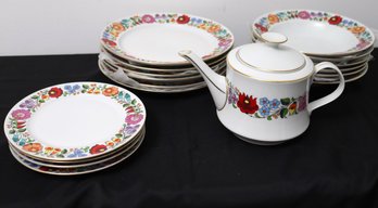 Hungarian White Porcelain Dishes And Teapot With Floral Trim.