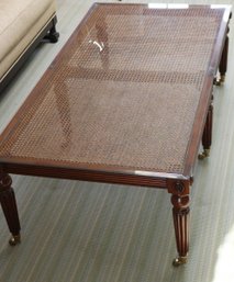 English Regency Style Caned Coffee Table With Fluted Wooden Legs And Glass Top.