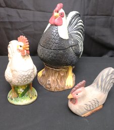 Three Chicken Themed Decorative Items With Small Carved Wood And Two Ceramic, Including A Cookie Jar.