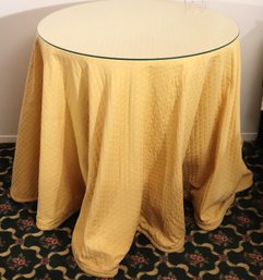 Round Rough Table With Custom Made Yellow Tablecloth And  Protective Glass Top