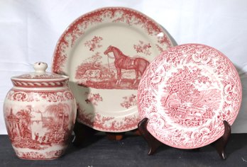 Three Ironstone Decorative Pieces With 2 Plates, And Covered Jar With Pink Toile Motif.