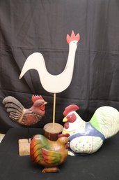 Four Wood And Papier Mache Decorative Items Of Rustic Style Roosters.