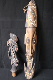 Papua New Guinea Carved And Painted Wood Flute Stopper, And 27 Inches Long Ornamental Mask.