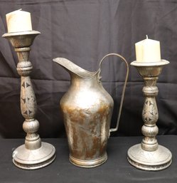 Two Tin Wrapped Candle Holders And A Tin Ewer.