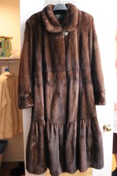 The American Fur Awards Maximilian Brown Mink Coat.  Approximate Size 12-14.