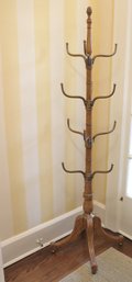 Theodore Alexander Coat Rack With 4 Tiers Of Brass Hooks On Light Wood Center.