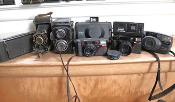 Collection Of Vintage Cameras As Pictured Includes Ciro Flex, Polaroid, Nikon