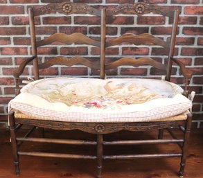 Country French Oak Double Settee With Rattan Seat And Aubusson Pillow.