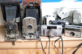 Collection Of Vintage Cameras As Pictured Includes Polaroid, Canon, Pentax & More