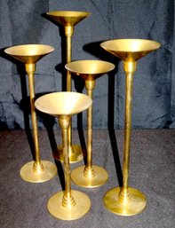 Five Silvestri Brass Candlesticks In Assorted Sizes